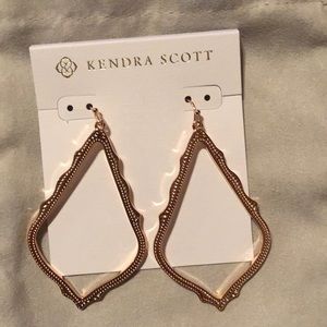 Kendra Scott earrings.